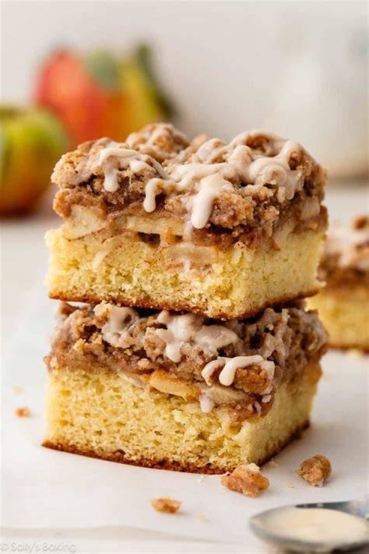 Apple crumb cake in a white baking dish.