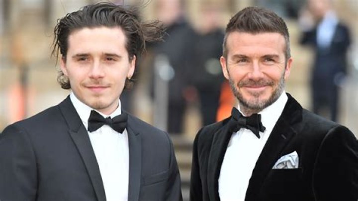 Brooklyn Beckham with his dad
