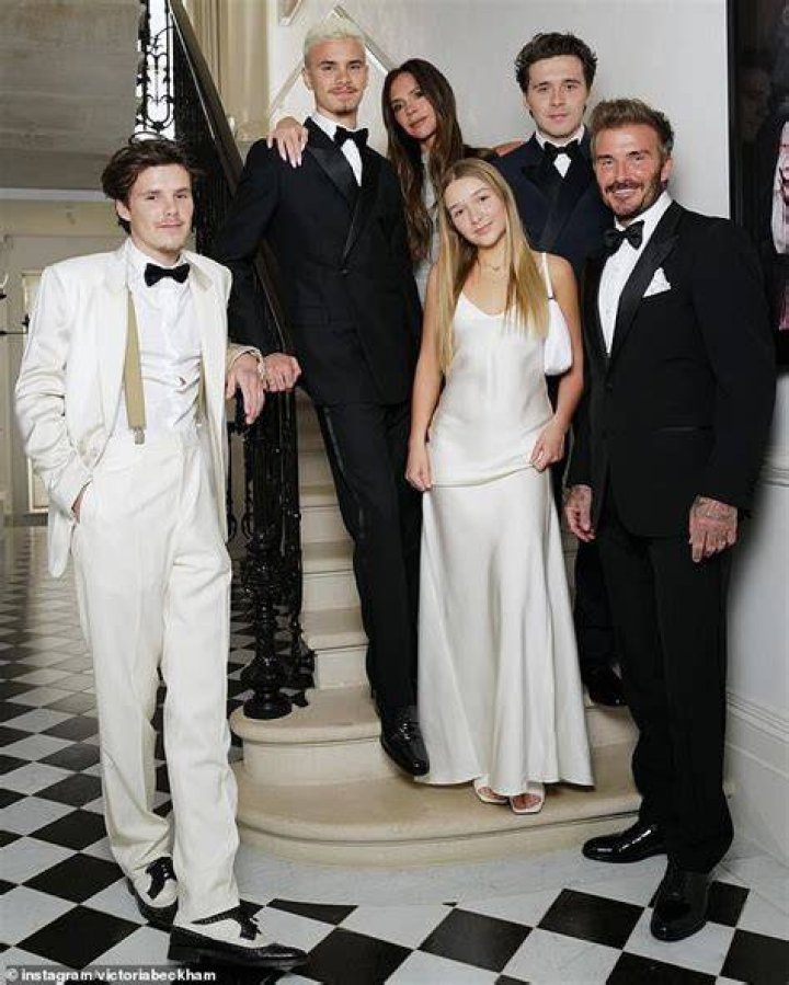 Brooklyn Beckham with his father