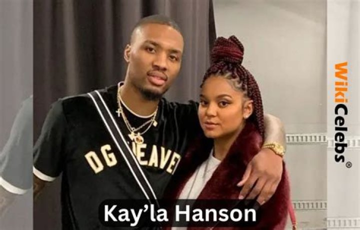 Damian Lillard with Kay&rsquo;la Hanson and their kid