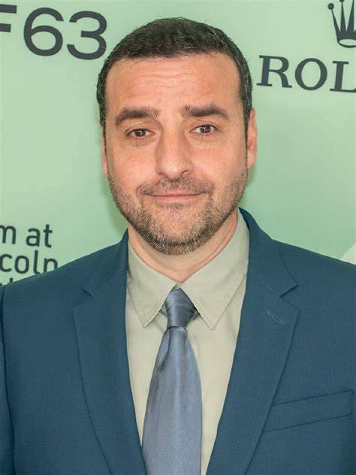 David Krumholtz giving a pose in an event.