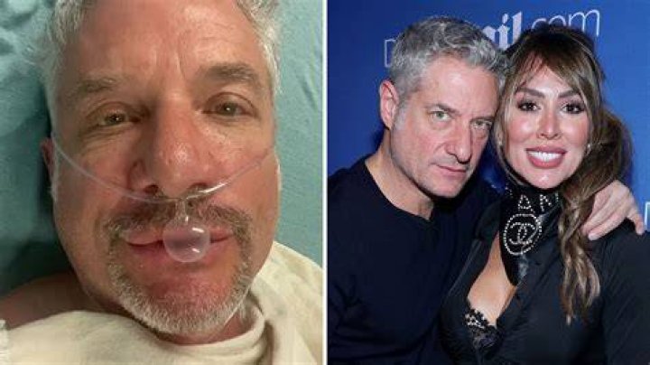 Rick Leventhal's fiance Kelly Dodd kissing him on his cheeks.