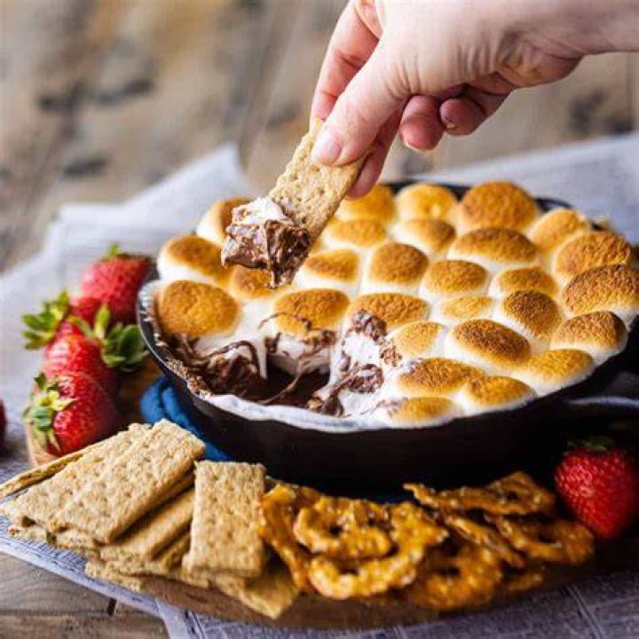 Smores dip on a graham cracker.